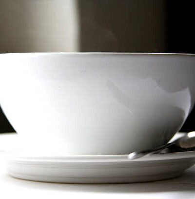 White porcellaine bowl with plate and spoon, simple