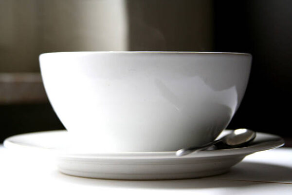 White porcellaine bowl with plate and spoon, simple