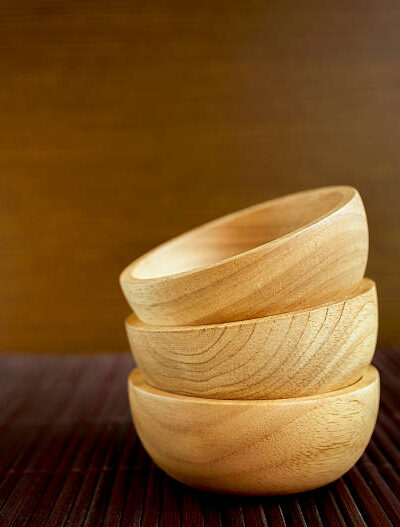 Wooden bowls with natural pattern, selective focus